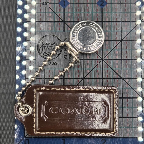 Coach Accessories - Coach Brown Leather and Silver Hangtags